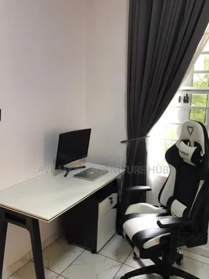 Office Desk and Furgle Gaming Chair.