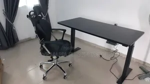 Electric Adjustable Height Desk and Chair.