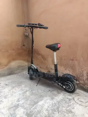 Photo - Used 48 Volts Electric Scooter With Sit And Charger