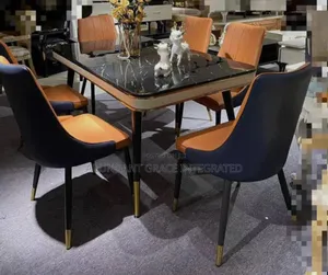 Pin Legs Marble Dinning With 6 Seaters.