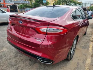 Ford Fusion Titanium 4dr Sedan AWD w/EcoBoost (2.0L 4cyl Turbo 6A) 2014