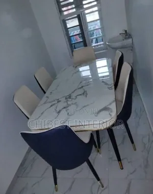 Standard Marble Dining Table With Six Chairs.