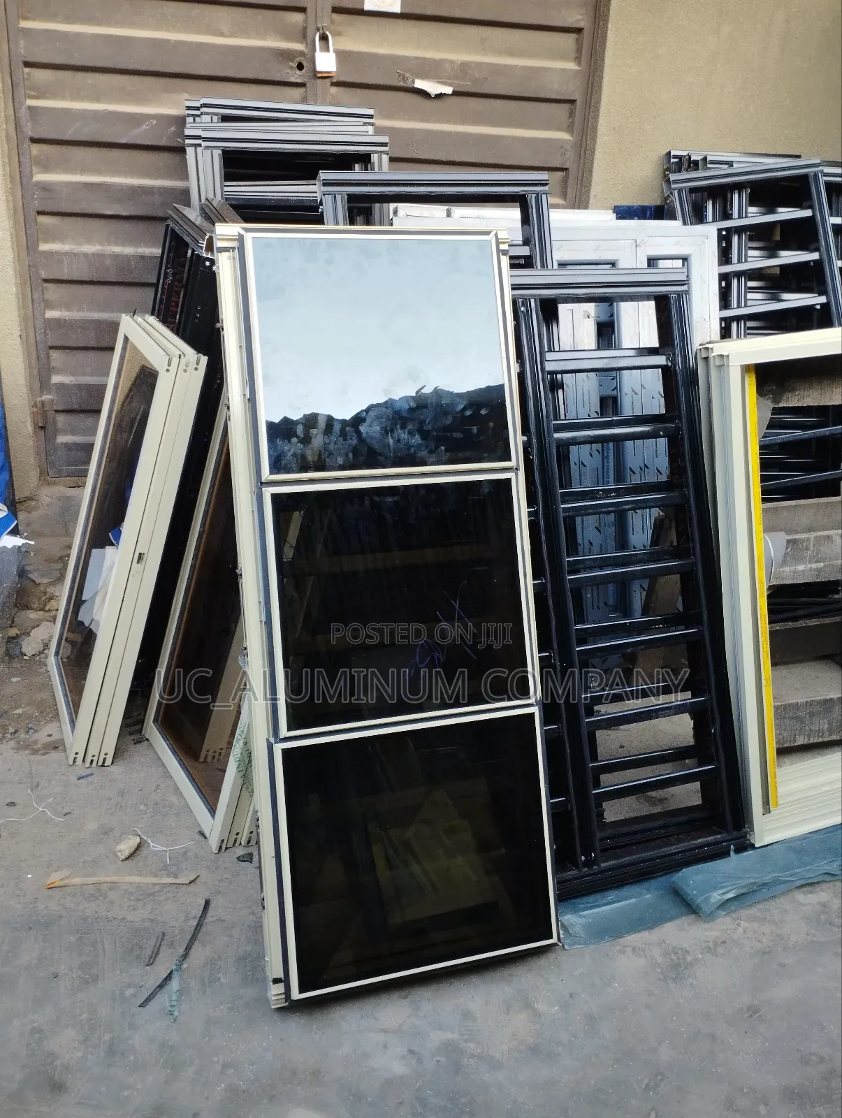 White Frameless Window With Burglary and Net