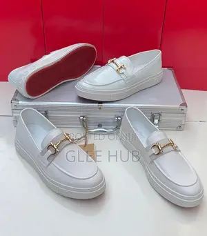 Photo - White Single-Soled Loafers