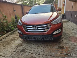 Hyundai Santa Fe Limited 4dr SUV AWD (3.3L 6cyl 6A) 2014 Orange
