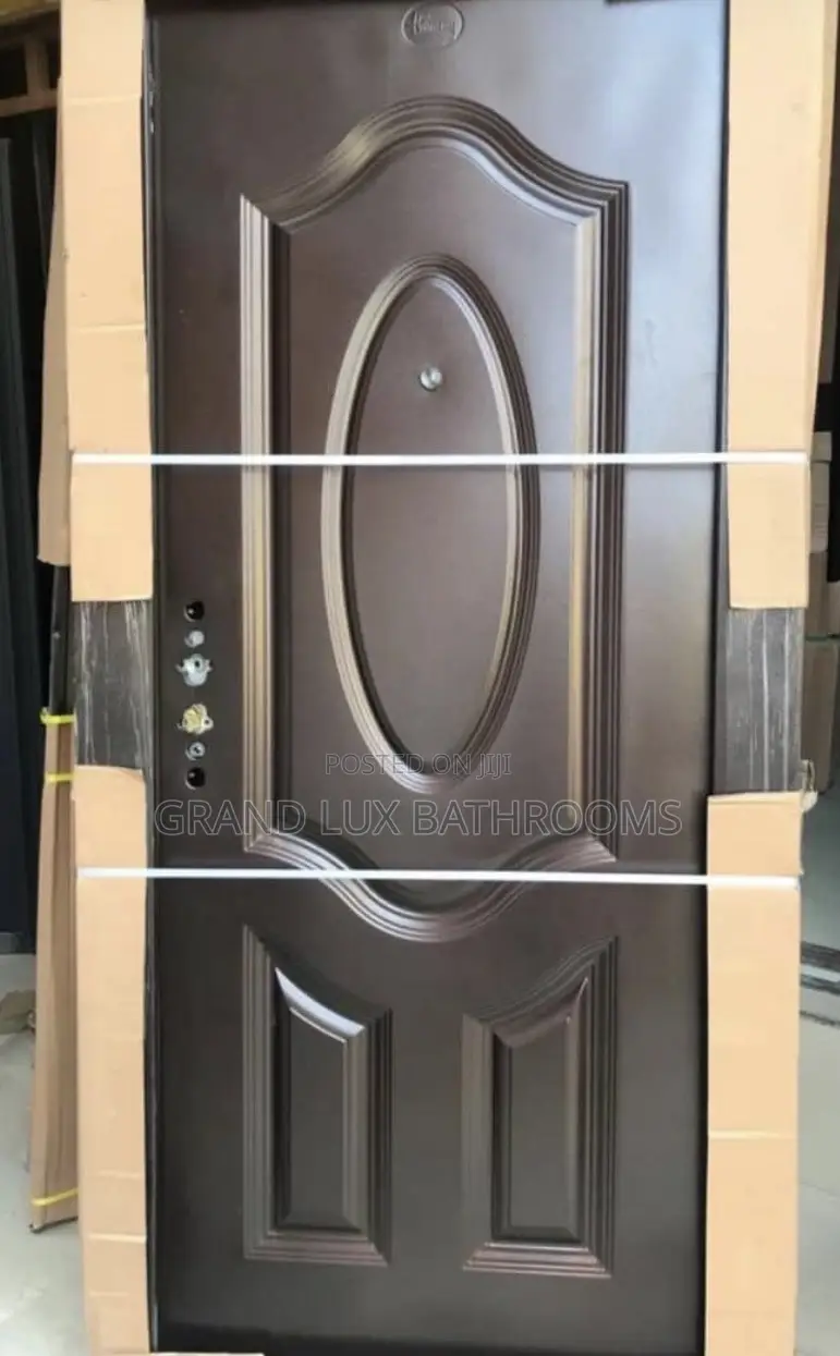 Embossed Steel Security Door With Central Oval Panel Design