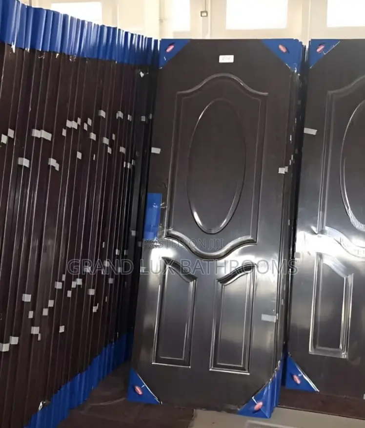 Embossed Steel Security Door With Central Oval Panel Design