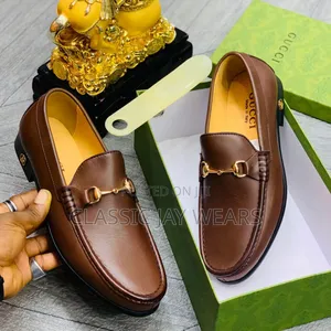 Photo - Plain Leather Brown Gucci Shoe Available