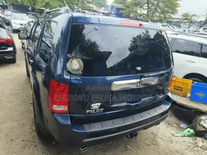 Honda Pilot Touring w/RES/Navi 4WD (3.5L 6cyl 5A) 2011 Blue