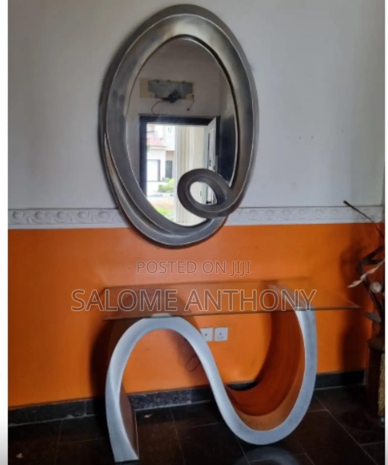 Mirror and a Glass Table