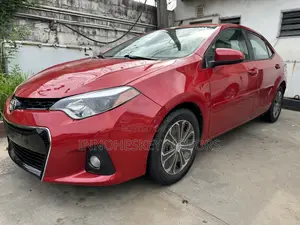 Photo - Toyota Corolla LE 4dr Sedan (1.8L 4cyl CVT) 2015 Red