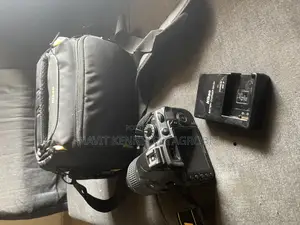 Photo - Nikon D3100 With Free Bag Battery Charger