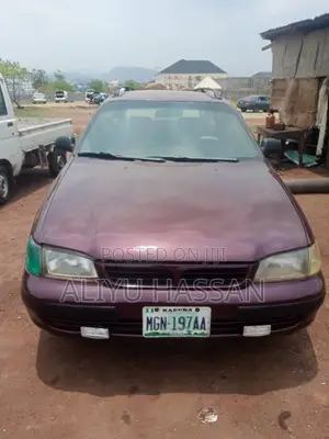 Photo - Toyota Carina E 1998 Burgundy