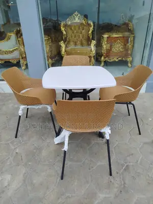Restaurant Table and 4 Brown Chairs