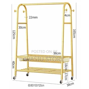 Golden Freestanding Clothes Rack With Wheels