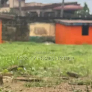 An Empty Land Fenced and Gated Available