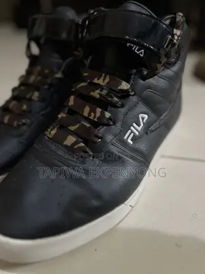 Photo - Black Fila Hightops