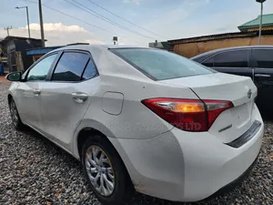 Toyota Corolla L 4dr Sedan (1.8L 4cyl 4A) 2015 White