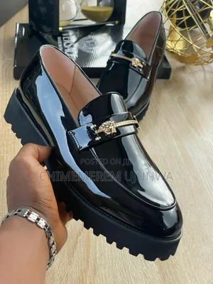 Photo - Corporate Versace Shoe Available