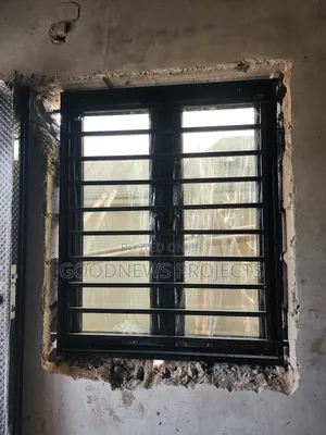 Black Casement Window With {Iron Burglary} and Nets