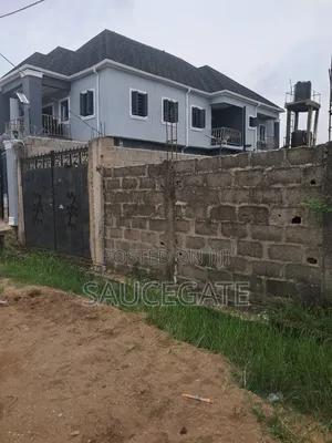 Half Plot Fenced and Gated Dry at Ijegun Satellite Good