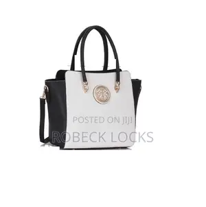 Elegant Two-Tone Medallion Handbag