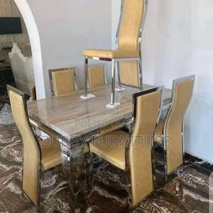 Quality and Imported Marble Top Dining Table by 6 Chairs