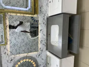 Photo - Modern Bathroom Vanity With Marble Accents