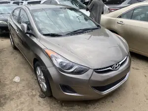 Photo - Hyundai Elantra GLS Sedan FWD (1.8L 4cyl 6M) 2013 Brown