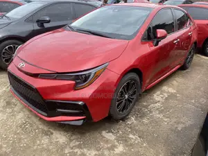 Photo - Toyota Corolla LE 2021 Red