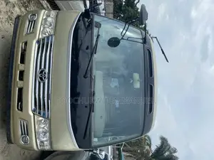 Photo - Toyota Coaster 2010 Gold