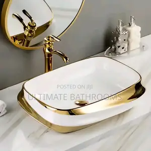 Sleek White and Gold Counter Top Basin