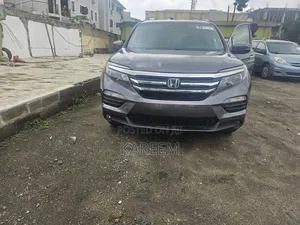 Honda Pilot Touring 4dr SUV 4WD (3.5L 6cyl 9A) 2016 Gray