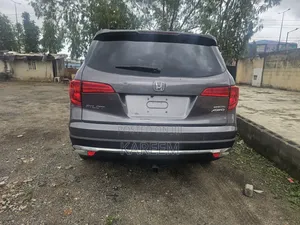 Honda Pilot Touring 4dr SUV 4WD (3.5L 6cyl 9A) 2016 Gray