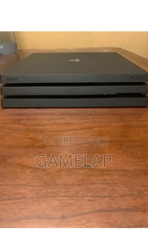 Uk Ps4 Pro With 10 Games Two Pads 1tb
