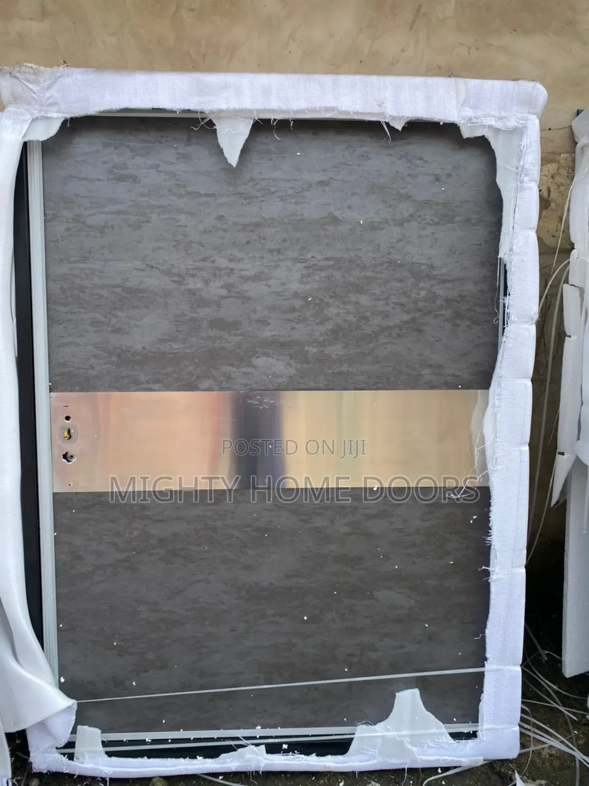 Unique Gray Pivot Door.