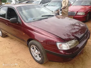 Photo - Toyota Carina E 1.6 Sedan 1996 Red