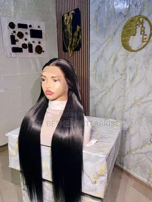 Photo - Chinese Bone Straight Hair Wig 28” With 13 by 4 Frontal