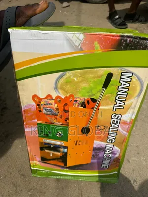 Mamual Cup Sealing Machine.