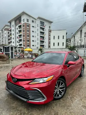 Photo - Toyota Camry XLE 2023 Red