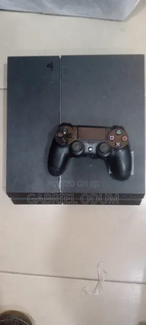 Playstation Consoles With 1 Pad and 5 Games