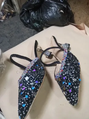 Photo - I Sell All Kinds of Hells Shoe's