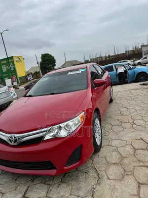 Photo - Toyota Camry L 4dr Sedan (2.5L 4cyl 6A) 2014 Red