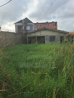 Half Plot for Sale With Old Bungalow at Ijegun Satellite