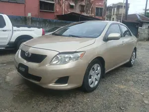 Photo - Toyota Corolla LE 4dr Sedan (1.8L 4 cyl 4A) 2009 Gold