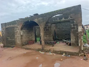 Photo - Two Plots of Land With a Structure on It
