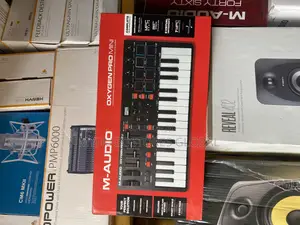 Photo - M-Audio Oxygen Pro Mini 32-Mini-Key Usb Midi Keyboard