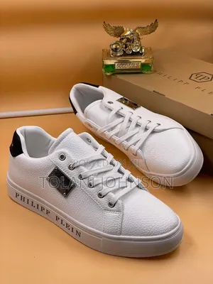 Photo - Plain White Designer Sneakers