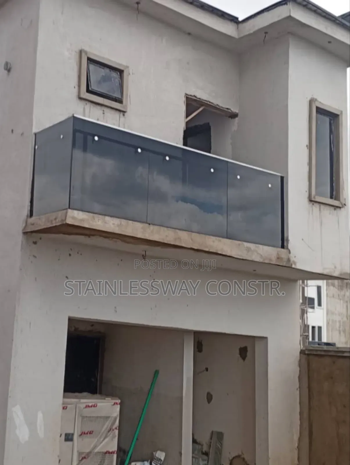 Dark Grey Glass Balcony Railing With Silver Nobes