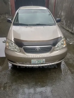 Photo - Toyota Corolla LE 2006 Gold